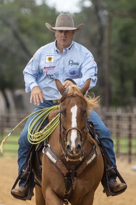 In the square drill, Crawford focuses on changing speeds, bringing back his hand and sitting deeper in the saddle to slow the horse down.