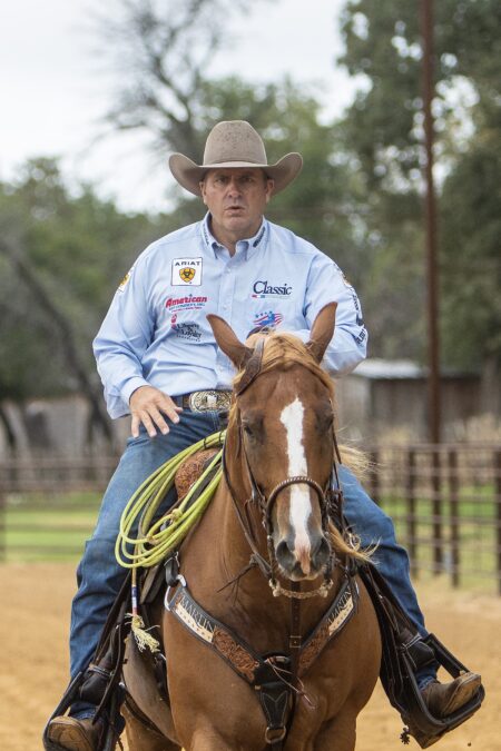 In the square drill, Crawford focuses on changing speeds, bringing back his hand and sitting deeper in the saddle to slow the horse down.